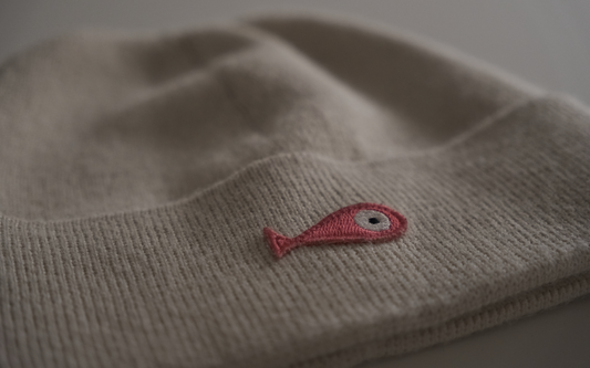 Beanie "fish" is designed for both style and functionality. Crafted from luxurious alpaca yarn, this beanie offer an unparalleled level of warmth and comfort.
