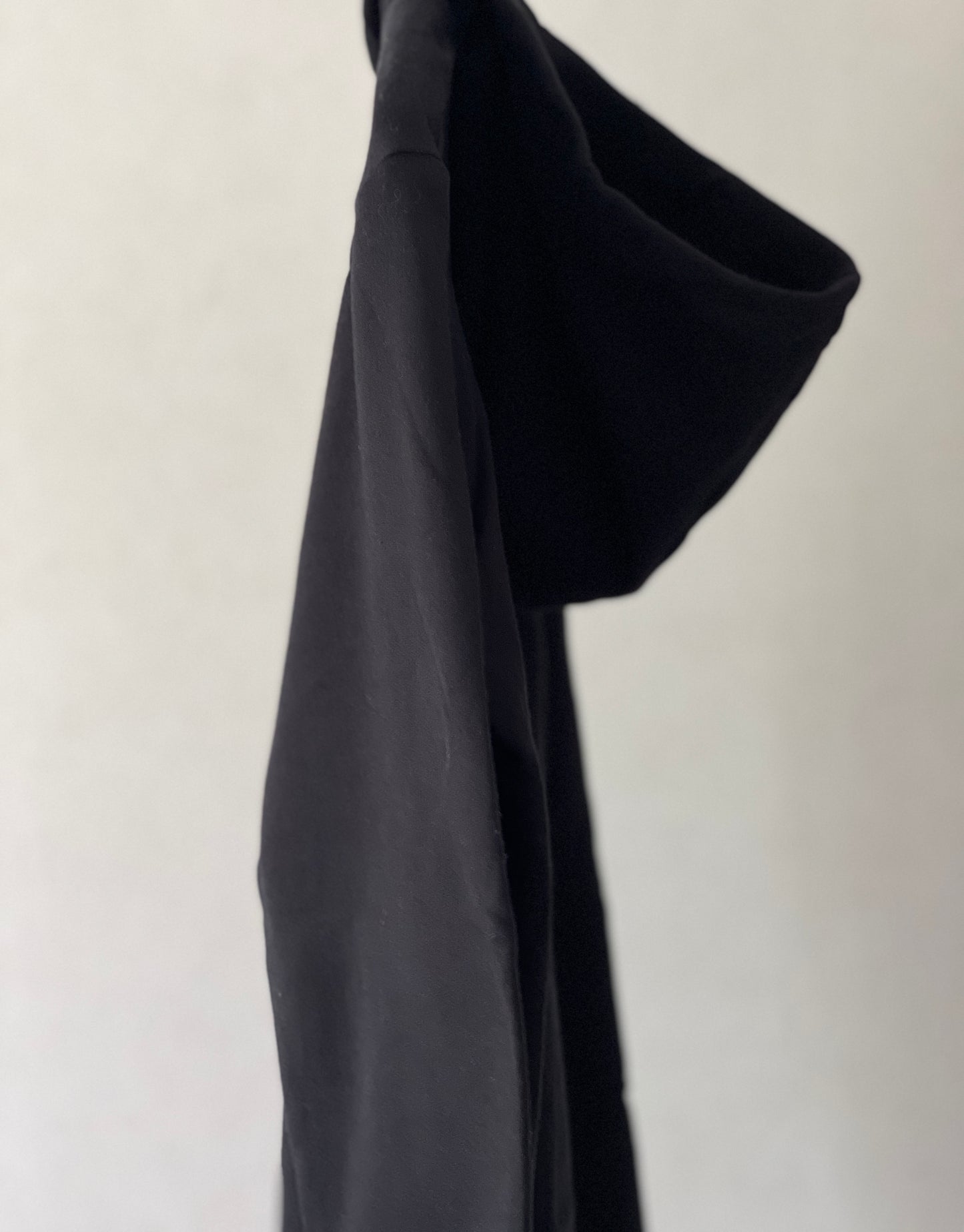 Super cozy Hoodie with a kangaroo pocket in the front with no drawstrings. Front zip closure. Crafted from 100 % superfine cotton. Raglan sleeves, ribbed trims. The pieces have a WOODI logo on front and a teddy character print on back bottom corner. Colour: black Material: 100% cotton