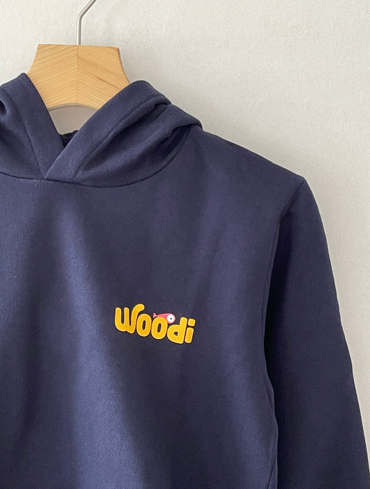 Super cozy hoodie with a kangaroo pocket in the front with no drawstrings. Crafted from the finest cotton. Raglan sleeves, ribbed trims. The pieces have a WOODI swirl text and fish print in the front. Colour: navy blue Material: 100% cotton