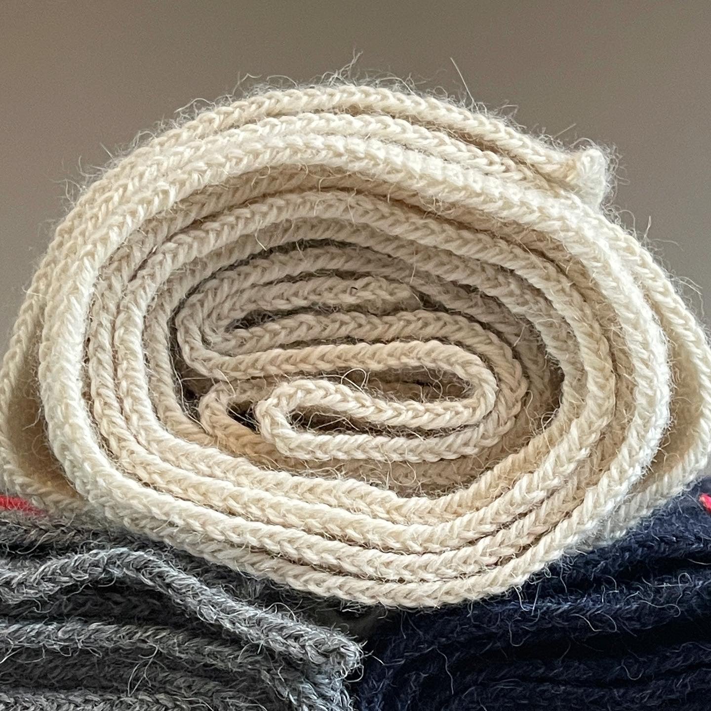 Soft, luxuriously and cozy scarfs. Knitted from a superfine alpaca yarn. Classic scarfs with a lovely feeling.  Colours : creme white, navy blue and grey  Material: 100% alpaca  Patch: pink fish  Sizes:  Navy Blue color : 2.20 cm x 22 cm  Grey color : 2.20 cm x 22 cm   Creme White color :  200 cm x 22 cm Detail Smart casual dress code
