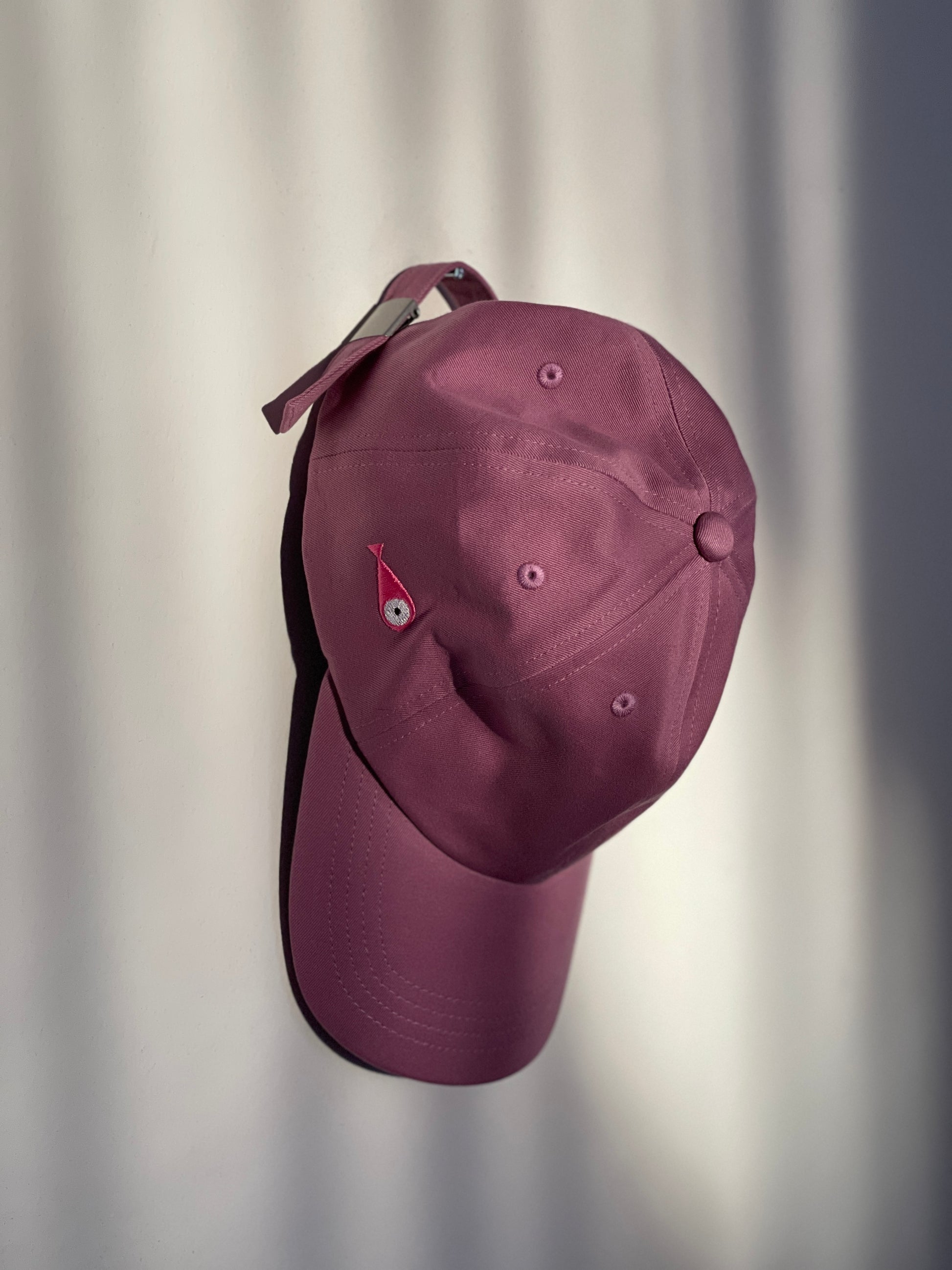 Cap Classic "Fish"  Slightly curved brim  Fish embroidery on the side  Label on the back  Buckle to adjust the fit  3 Colors available :   Light Blue  Grape Purple ( darker color than the sweet potato purple )  Sweet Potato Purple ( lighter color than the grape purple )  100 % cotton  One size