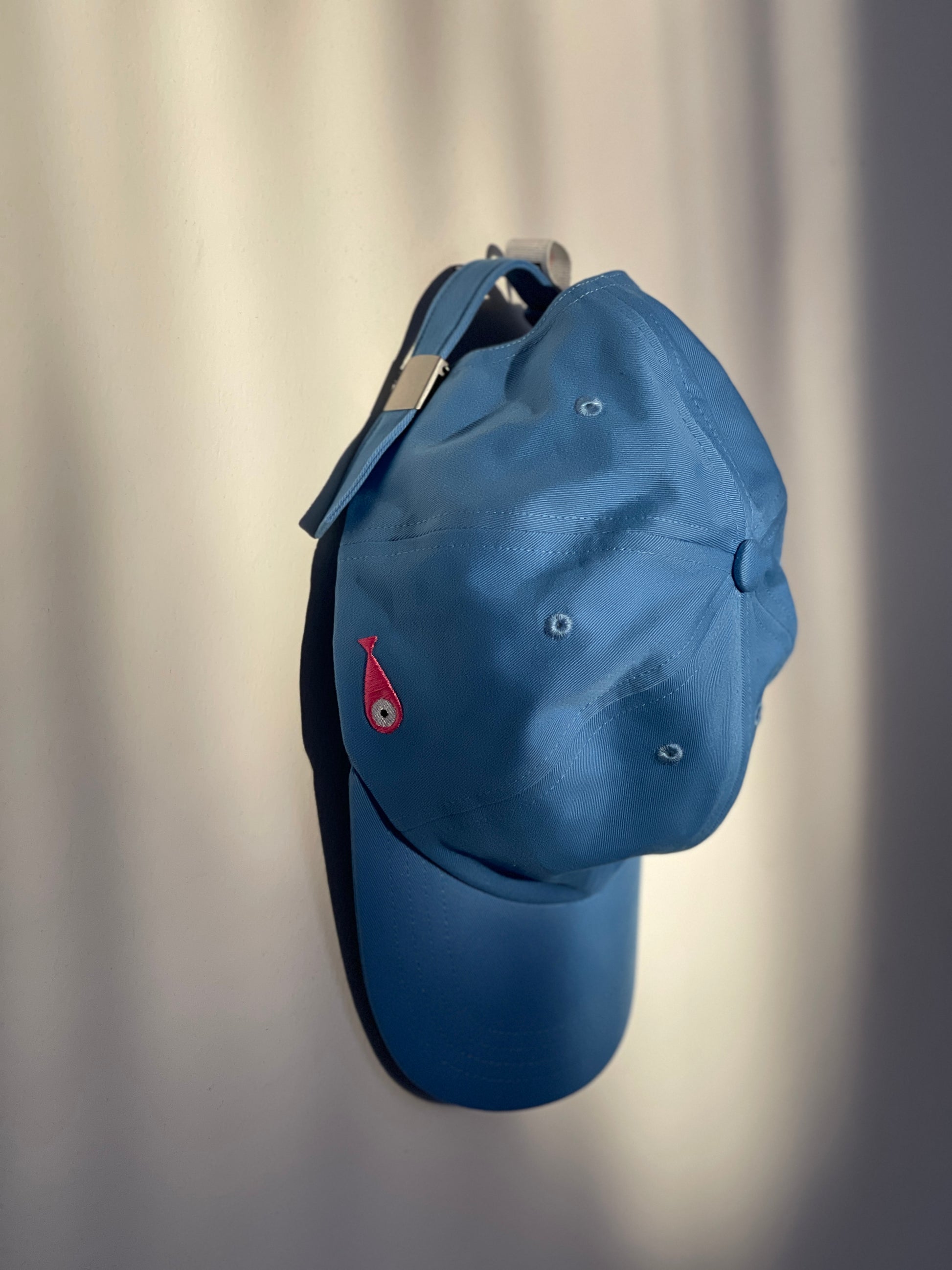 Cap Classic "Fish"  Slightly curved brim  Fish embroidery on the side  Label on the back  Buckle to adjust the fit  3 Colors available :   Light Blue  Grape Purple ( darker color than the sweet potato purple )  Sweet Potato Purple ( lighter color than the grape purple )  100 % cotton  One size