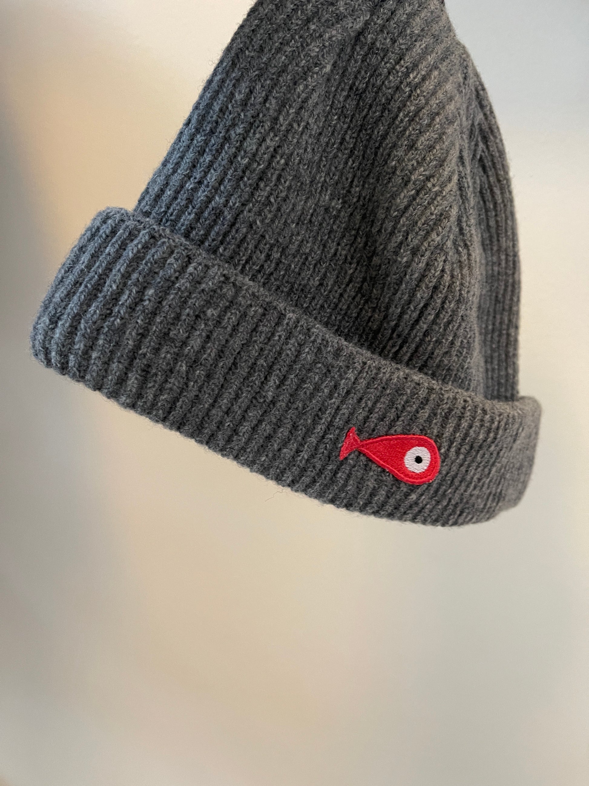 The collection of soft, colorful, and warm beanies crafted from luxurious lambswool yarn. Embrace comfort and style with these lovely accessories available in three charming colors: yellow, grey and brown