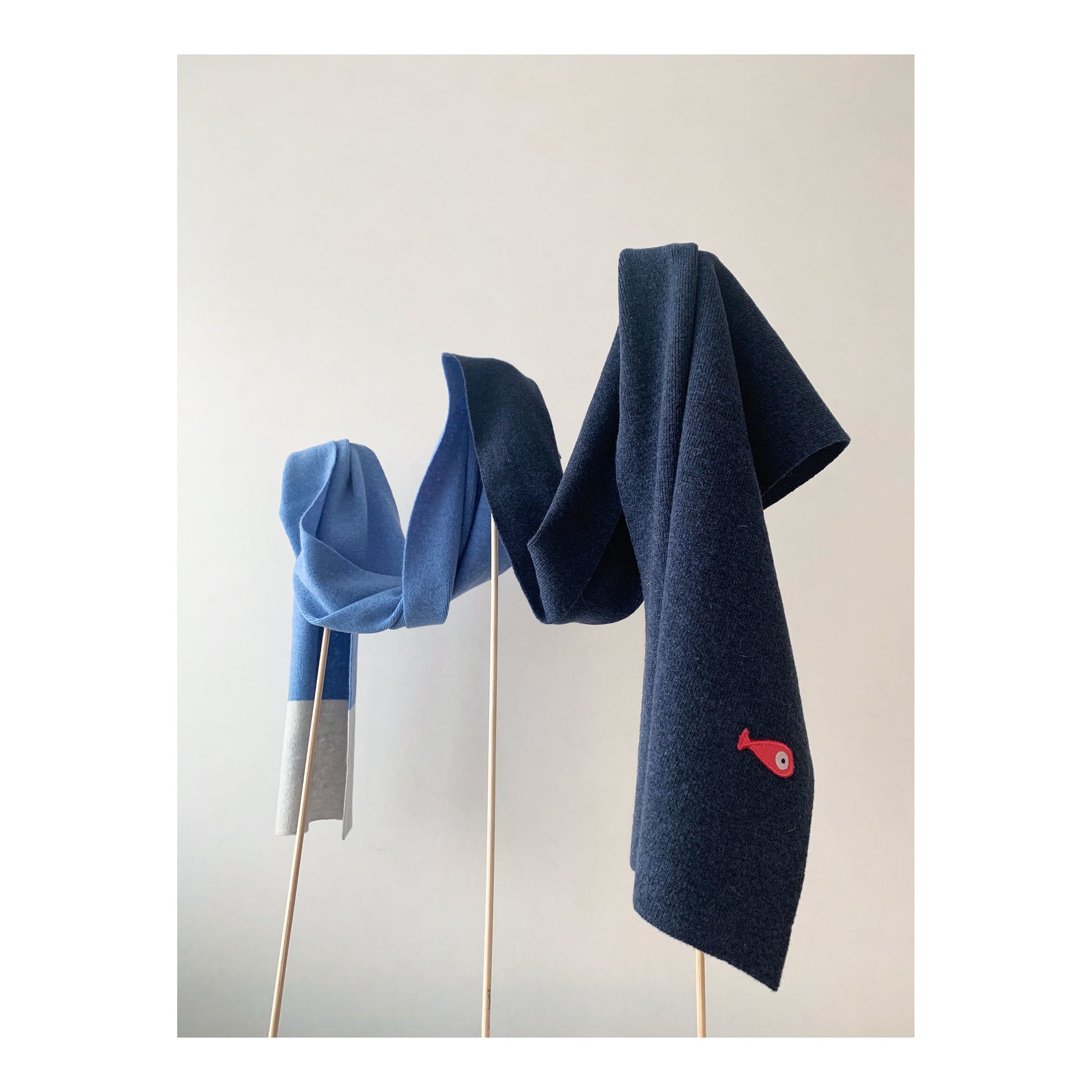 Soft, luxuriously and cozy scarfs. Knitted from a superfine lambswool yarn. Classic fit and a lovely feeling.  Colors available - blue striped, 8 colors and 3 colors  Size: 2.20 cm x 30 cm  100 % lambswool front