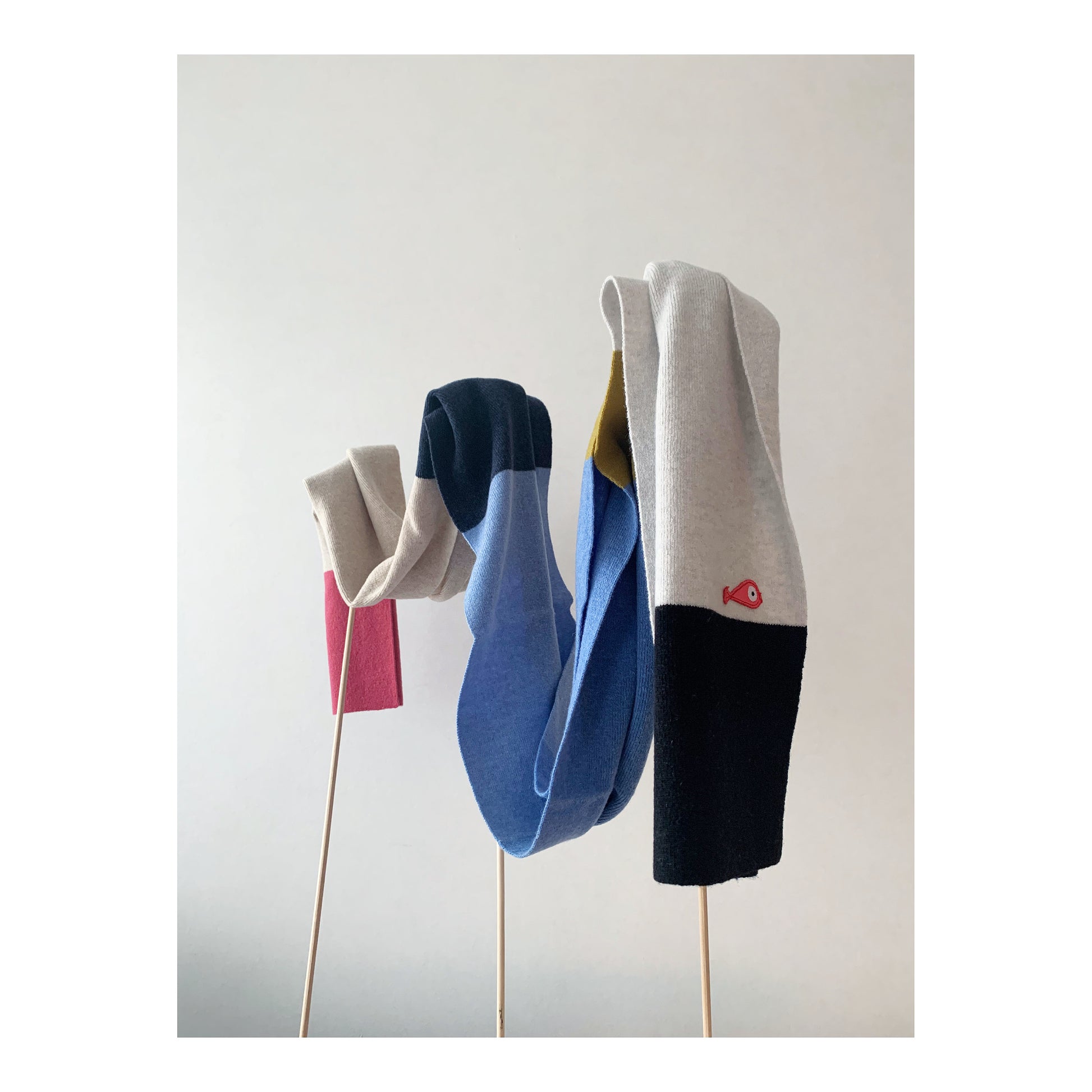 Soft, luxuriously and cozy scarfs. Knitted from a superfine lambswool yarn. Classic fit and a lovely feeling.  Colors available - blue striped, 8 colors and 3 colors  Size: 2.20 cm x 30 cm  100 % lambswool front