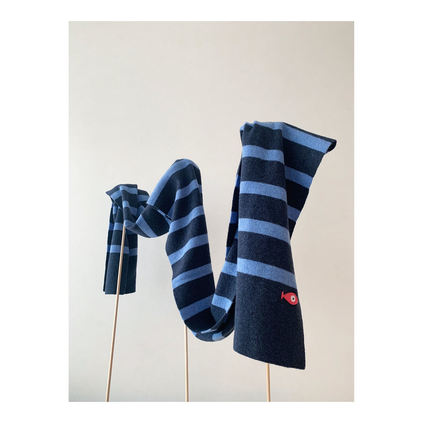 Soft, luxuriously and cozy scarfs. Knitted from a superfine lambswool yarn. Classic fit and a lovely feeling.  Colors available - blue striped, 8 colors and 3 colors  Size: 2.20 cm x 30 cm  100 % lambswool front