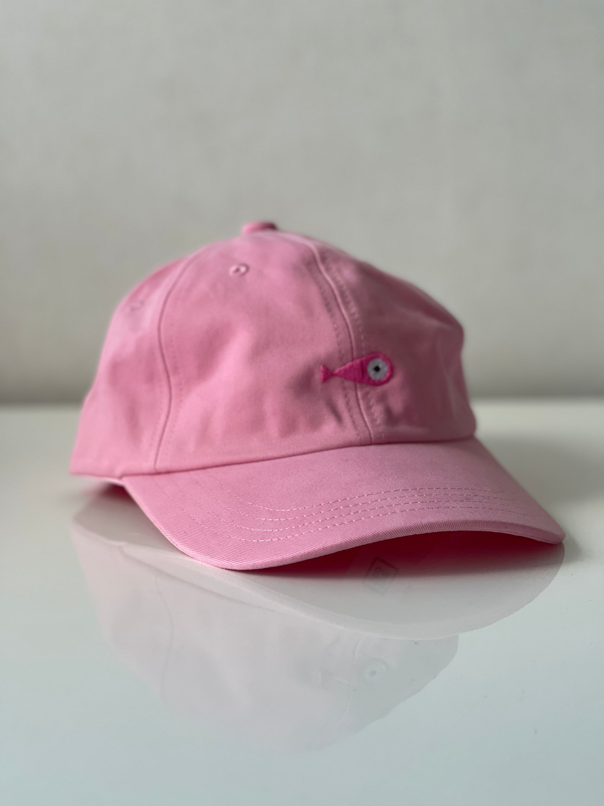 Cap Classic "Fish"  Slightly curved brim  Fish embroidery on front  Label on the back  Buckle to adjust the fit  5 Colors available : Navy Blue, Black, Pink, Olive Green and Light Beige  100 % cotton  One size  Front