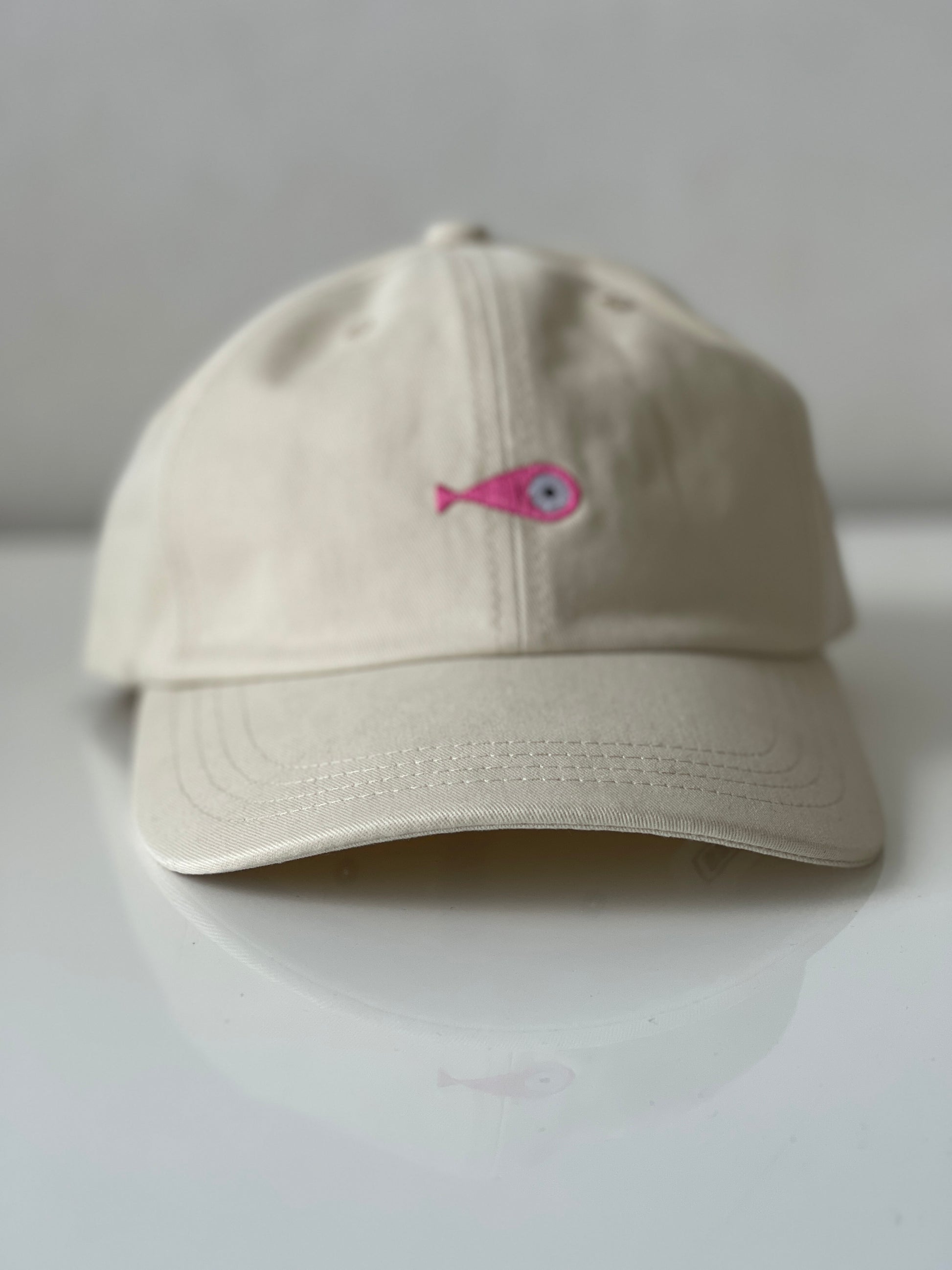 Cap Classic "Fish"  Slightly curved brim  Fish embroidery on front  Label on the back  Buckle to adjust the fit  5 Colors available : Navy Blue, Black, Pink, Olive Green and Light Beige  100 % cotton  One size 