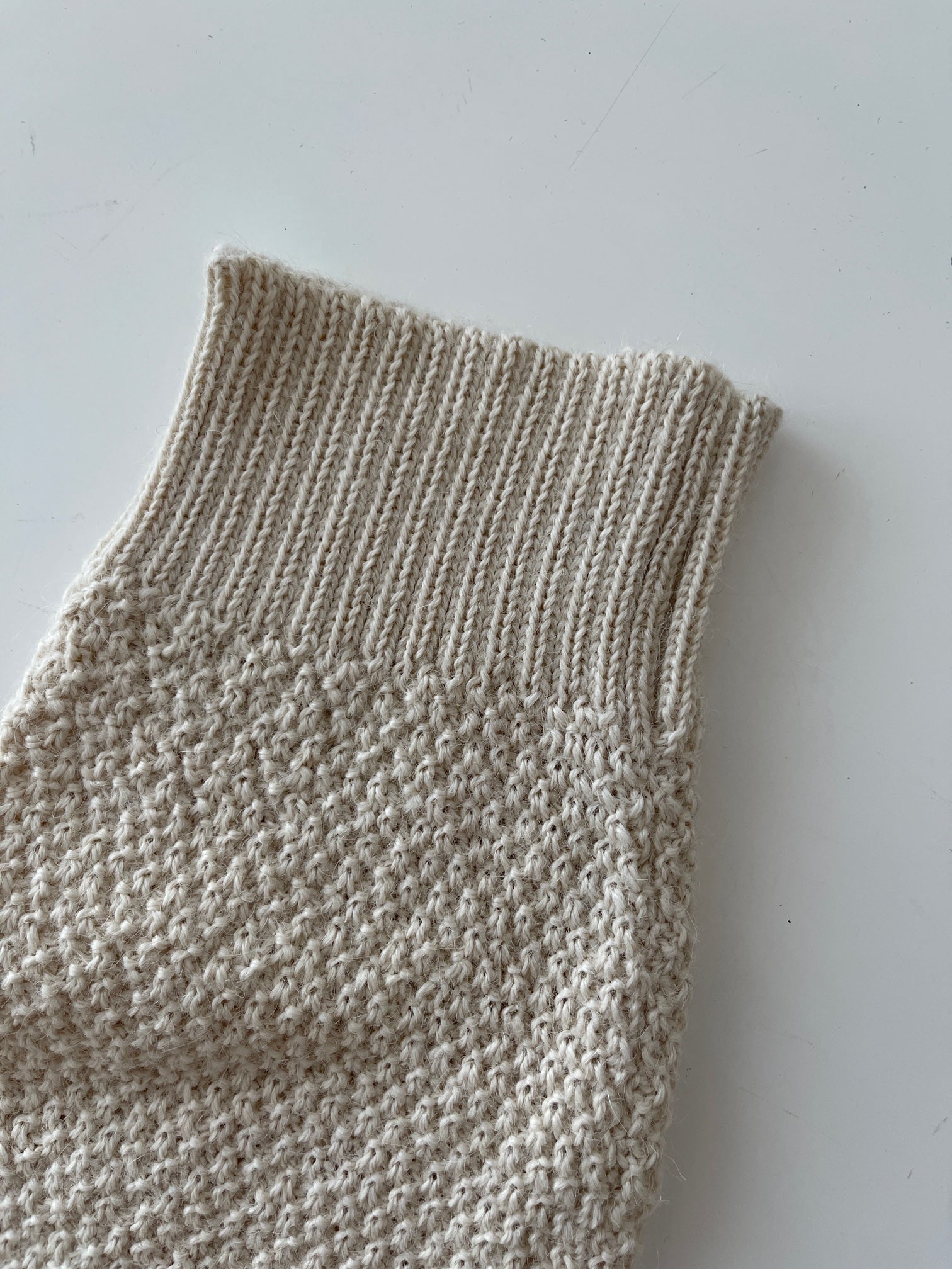 Soft, luxuriously cozy sweater. Knitted from fine alpaca yarn. Classic fit and a lovely feeling.  Colours : creme white, navy blue and grey  Patch: pink fish ( placed on the right bottom corner )  Material: 100% alpaca Detail Smart casual dress code