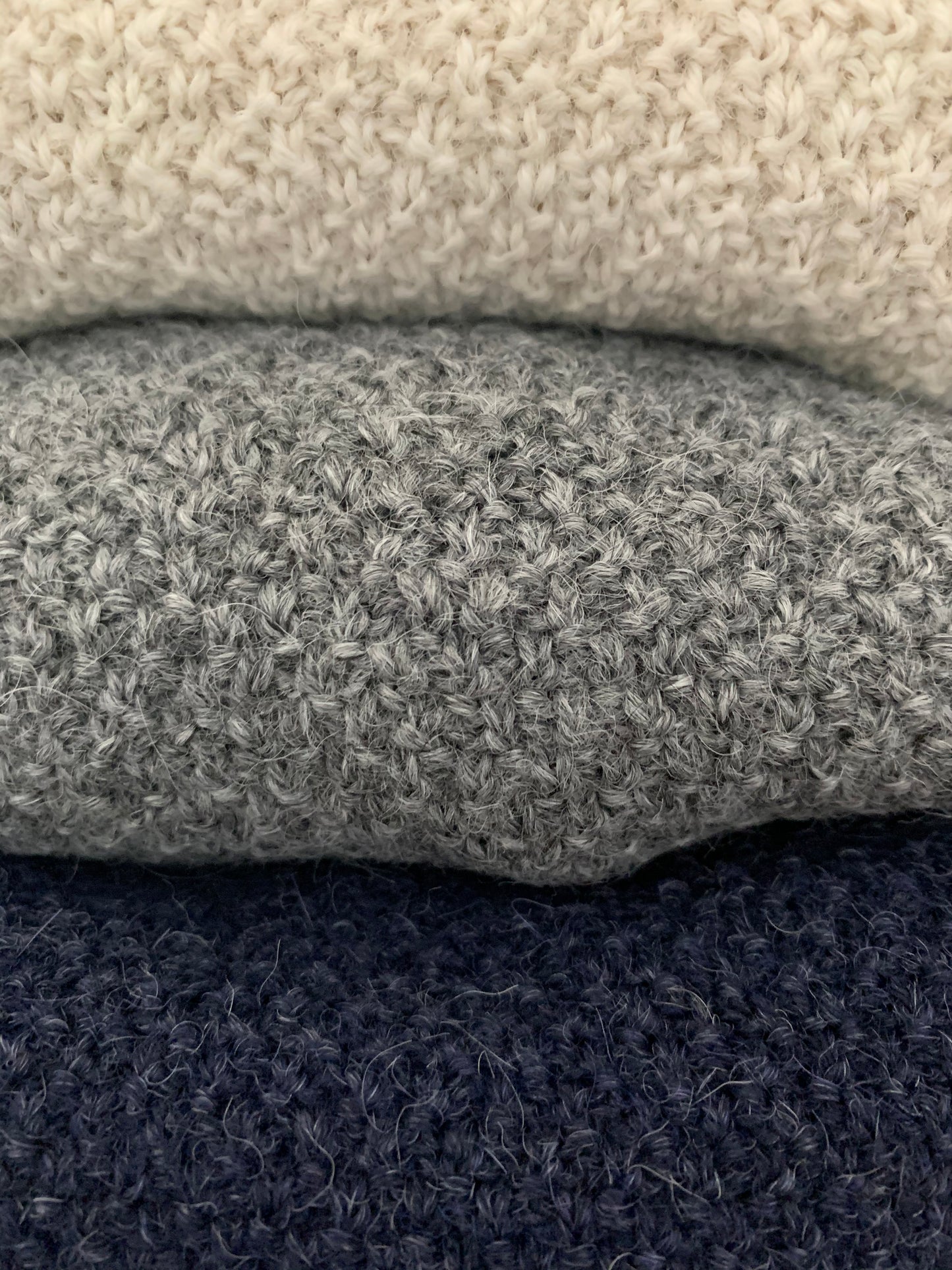 Soft, luxuriously cozy sweater. Knitted from fine alpaca yarn. Classic fit and a lovely feeling.  Colours : creme white, navy blue and grey  Patch: pink fish ( placed on the right bottom corner )  Material: 100% alpaca Detail Smart casual dress code